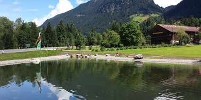Reisemobilstellplatz - Preis - Wunderschöner Bergsee - Camping am See Gut Lindlerhof, mit Ferienhäuser und Almhütten