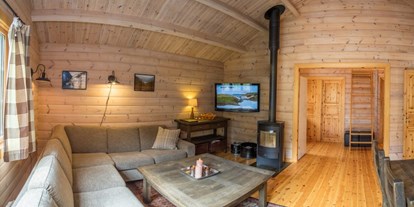 Reisemobilstellplatz - Norwegen - Unsere größten Hütten haben 3 Schlafzimmer, Kamin, Bad und Küche mit Backofen, großem Kühlschrank und Veranda mit toller Aussicht auf Østerbø - Østerbø Fjellstove